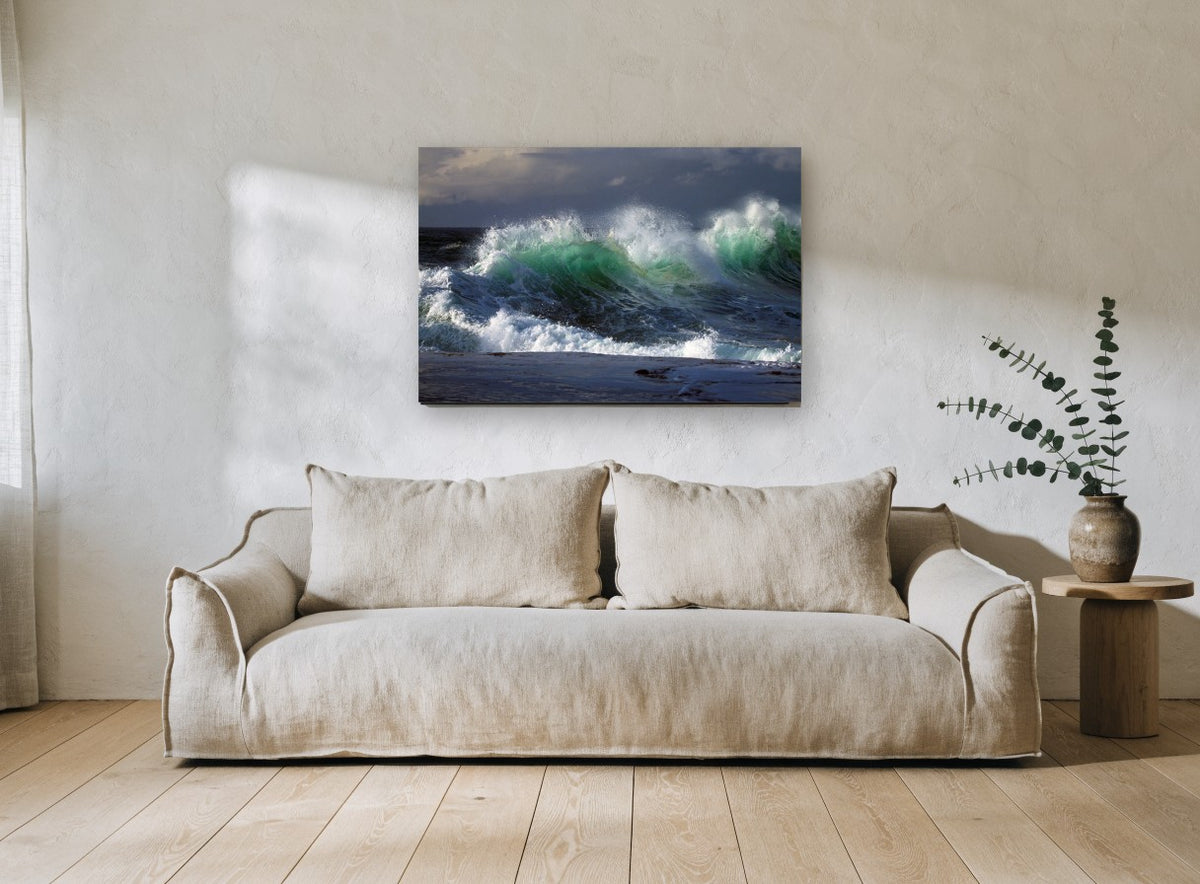 Emerald Surge coastal canvas print on the wall of a living room