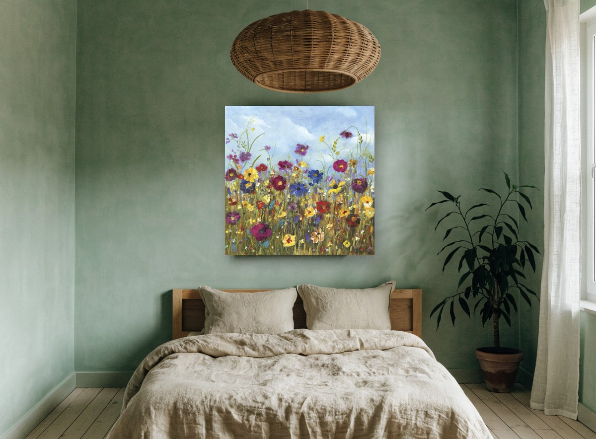 Meadow Under Blue Sky floral canvas print on the wall of a bedroom