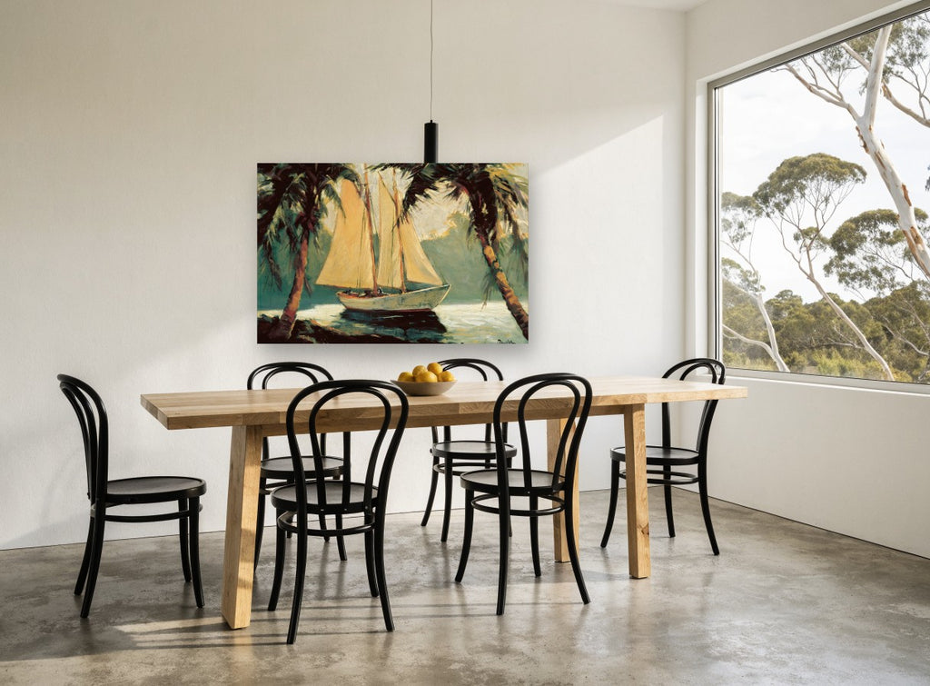 Schooner Between Palms coastal canvas print on the wall of a dining room