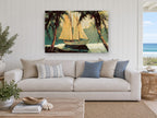 Schooner Between Palms coastal canvas print on the wall of a beach house living room