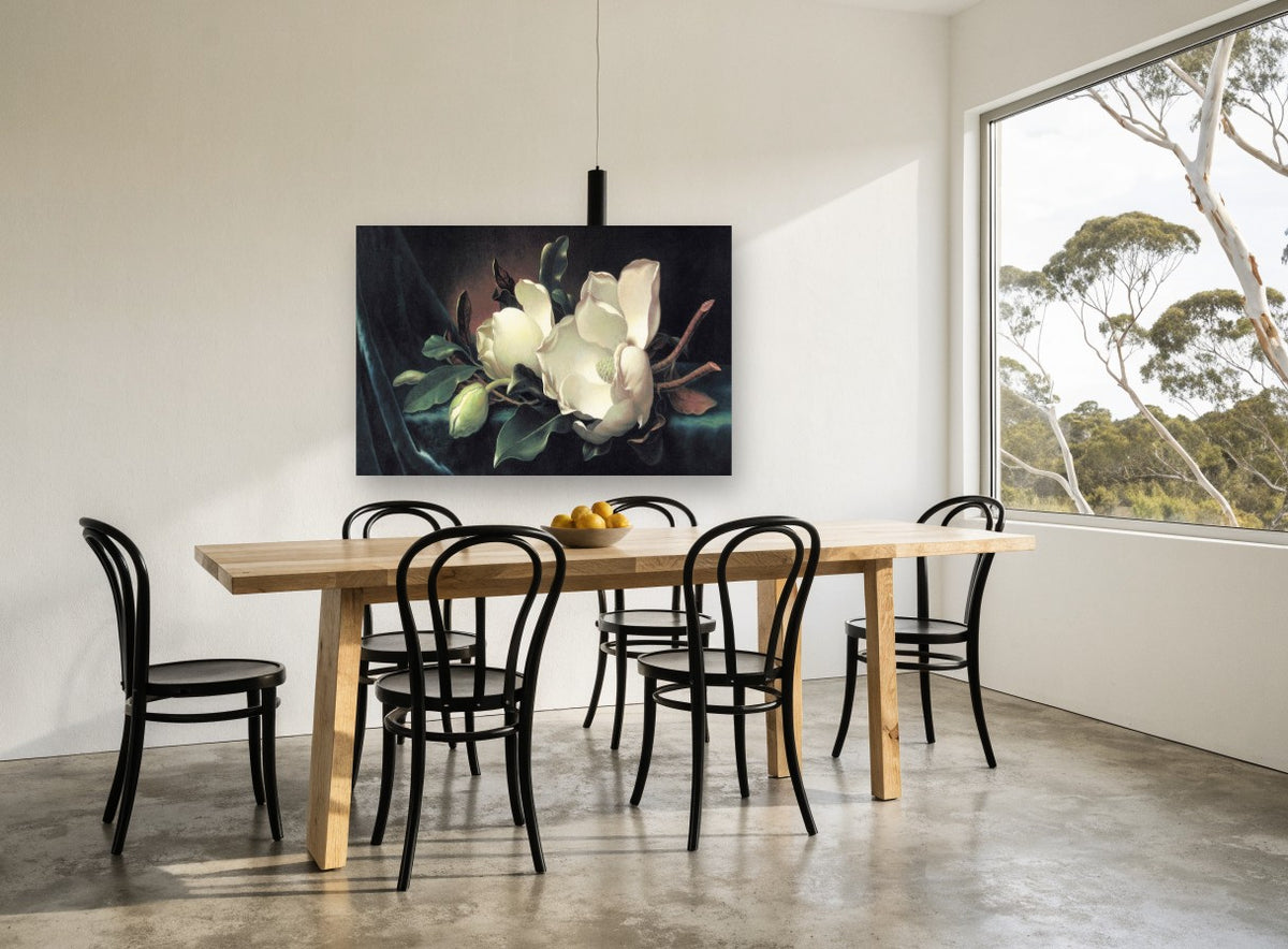 Magnolia on Teal Velvet floral canvas print on the wall of a dining room