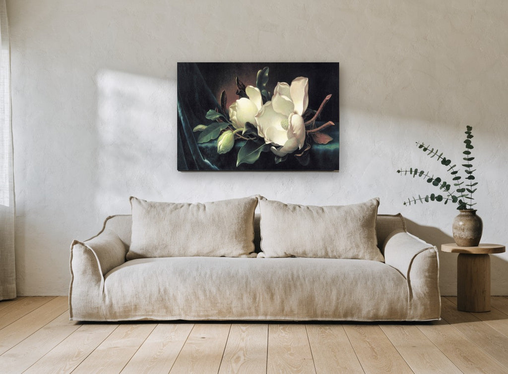 Magnolia on Teal Velvet floral canvas print on the wall of a living room