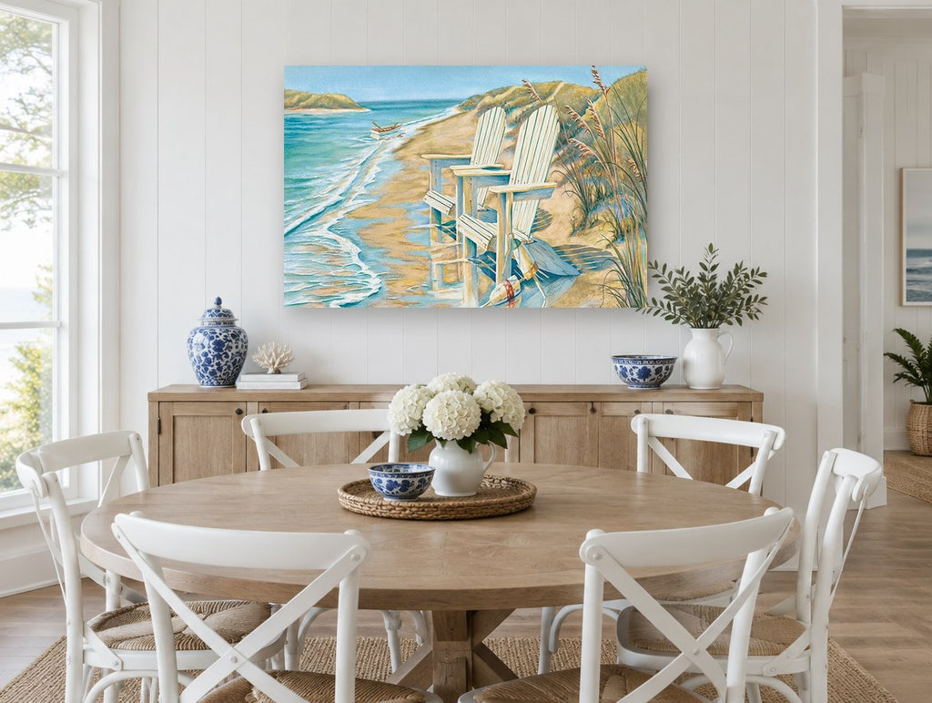 Two Chairs at the Shoreline coastal canvas print on the wall of a Hamptons dining room