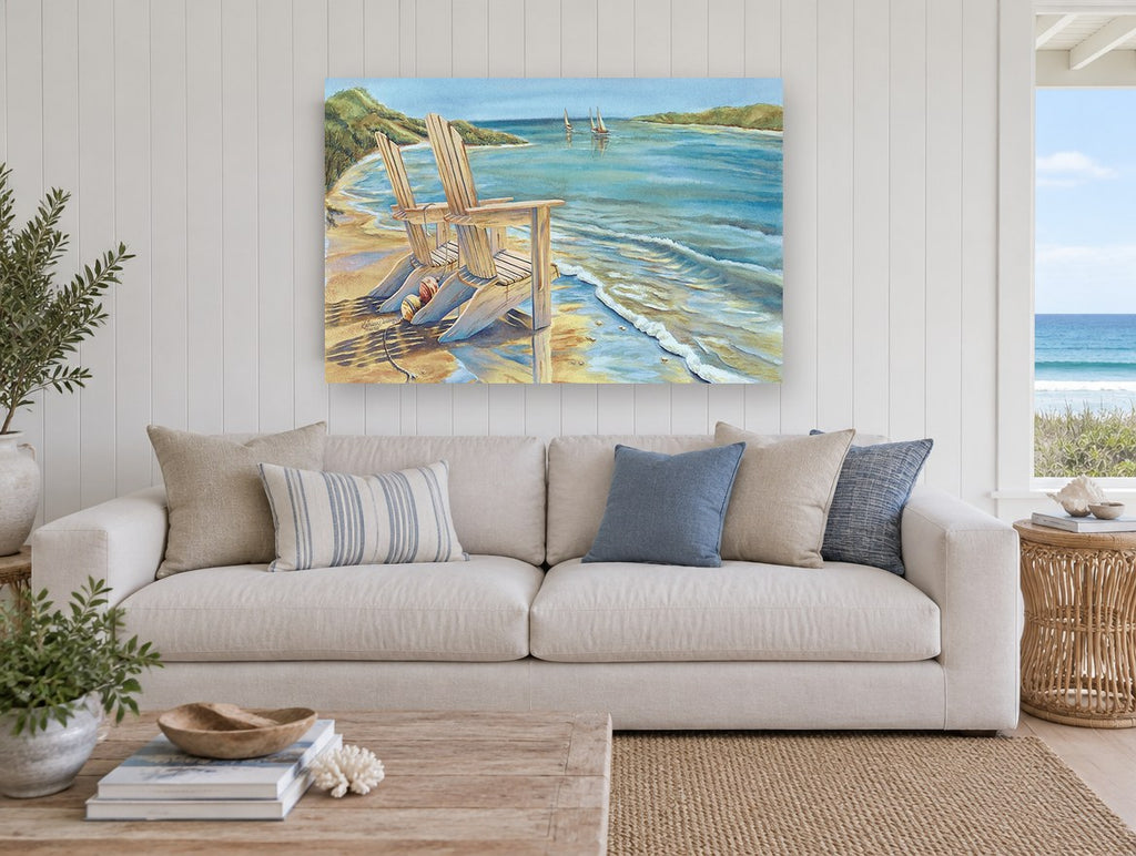 Two Chairs at the Shore coastal canvas print on the wall of a beach house living room