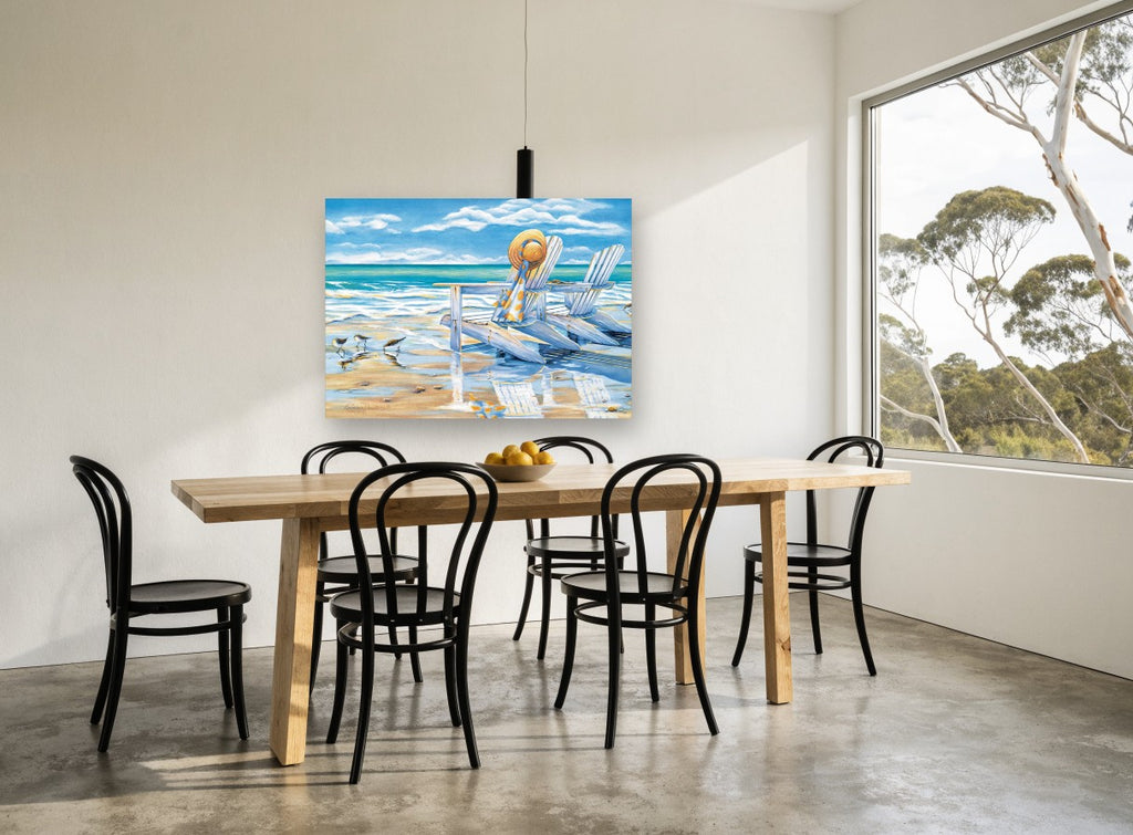 Sandpipers and Beach Chairs coastal canvas print on the wall of a dining room