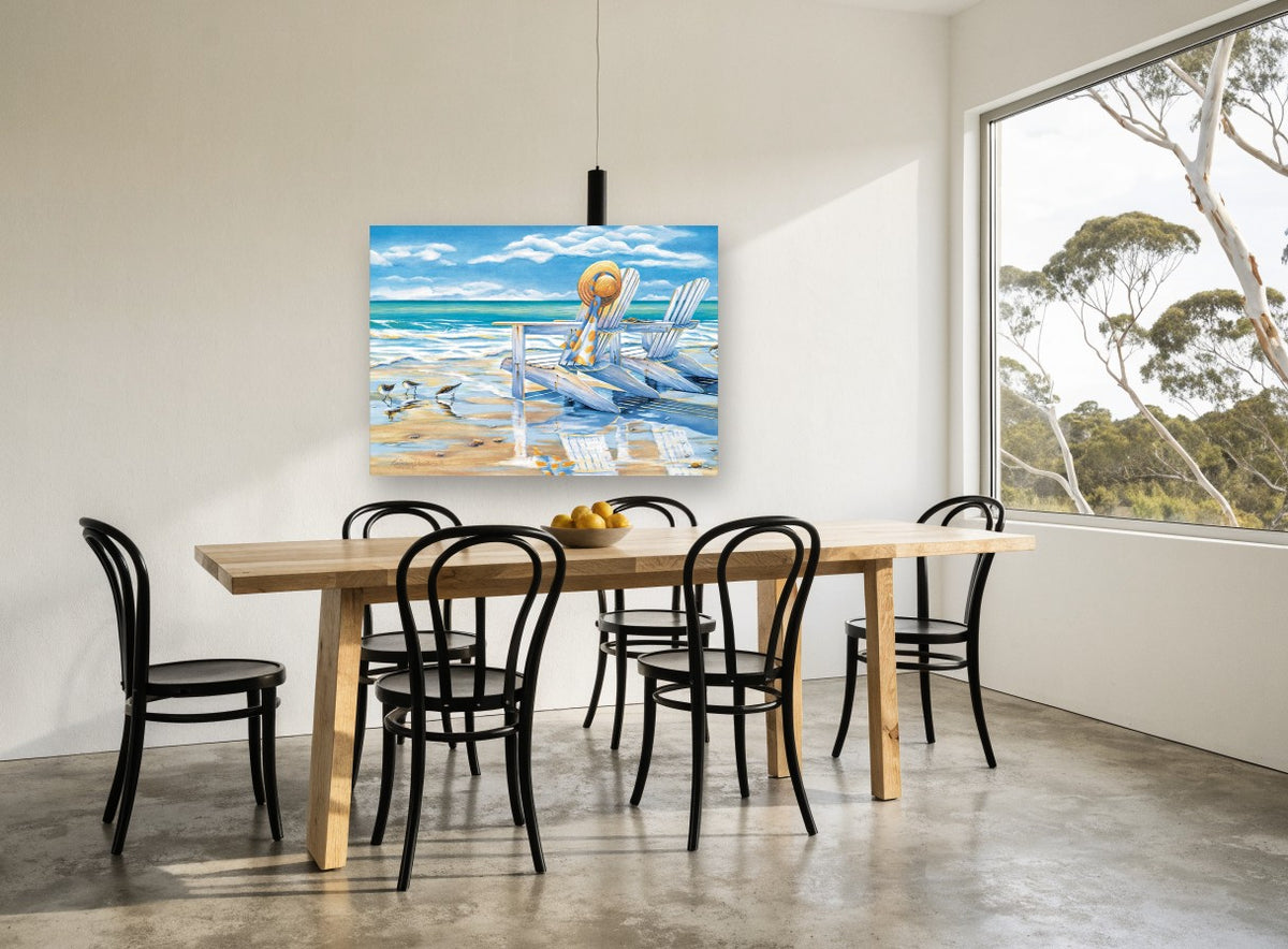 Sandpipers and Beach Chairs coastal canvas print on the wall of a dining room