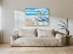 Sandpipers and Beach Chairs coastal canvas print on the wall of a living room