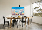 Two Chairs Seaside Rest coastal canvas print on the wall of a dining room