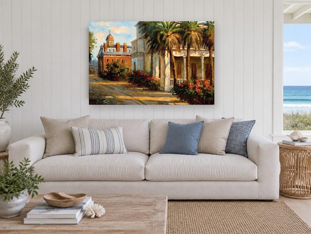Palm Courtyard Afternoon floral canvas print on the wall of a beach house living room