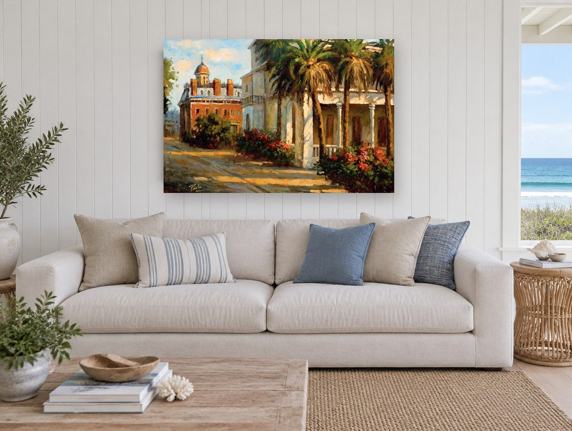 Palm Courtyard Afternoon floral canvas print on the wall of a beach house living room