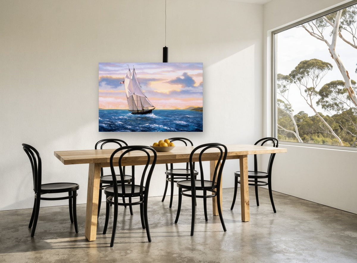 Schooner at Golden Dusk coastal canvas print on the wall of a dining room