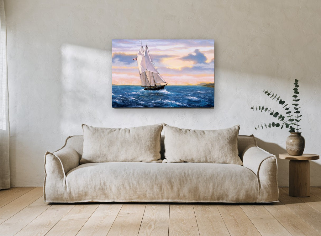 Schooner at Golden Dusk coastal canvas print on the wall of a living room