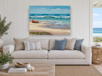Sandpipers and Beached Boat coastal canvas print on the wall of a beach house living room