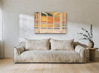 Open Doors to Sunset coastal canvas print on the wall of a living room