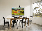 Poppy Meadow Village floral canvas print on the wall of a dining room