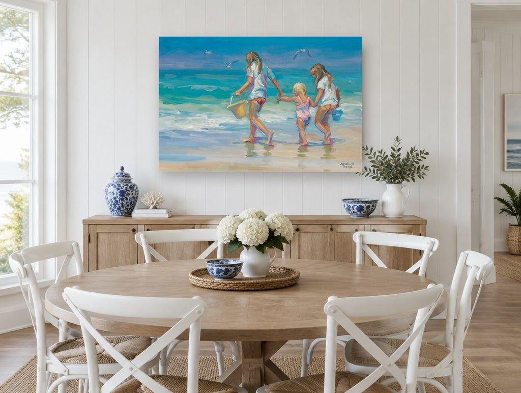 Three Girls at Water's Edge coastal canvas print on the wall of a Hamptons dining room