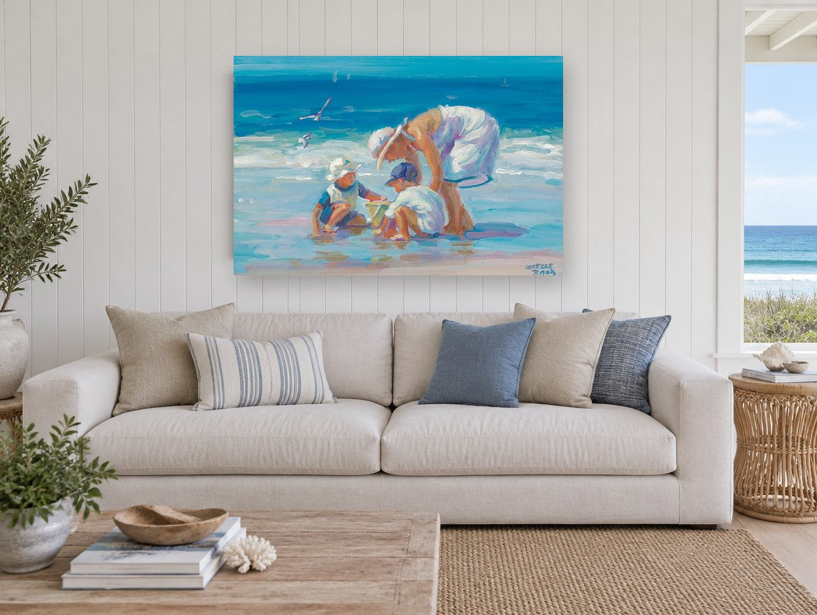 Bucket by the Shore coastal canvas print on the wall of a beach house living room