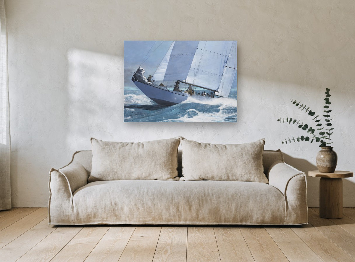 Heeling Into the Swell coastal canvas print on the wall of a living room
