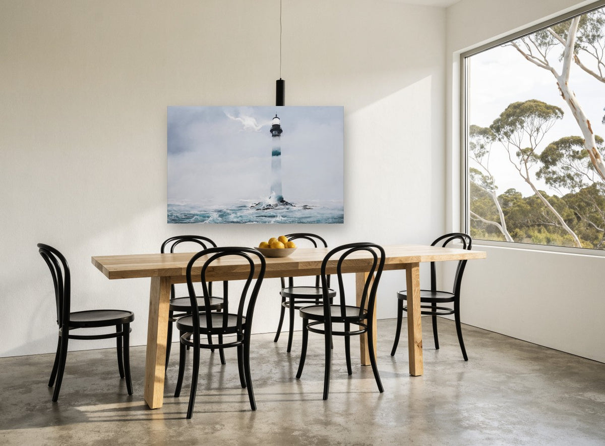 Lighthouse in Sea Fog coastal canvas print on the wall of a dining room