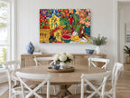 Parrots and Monkey Feast floral canvas print on the wall of a Hamptons dining room
