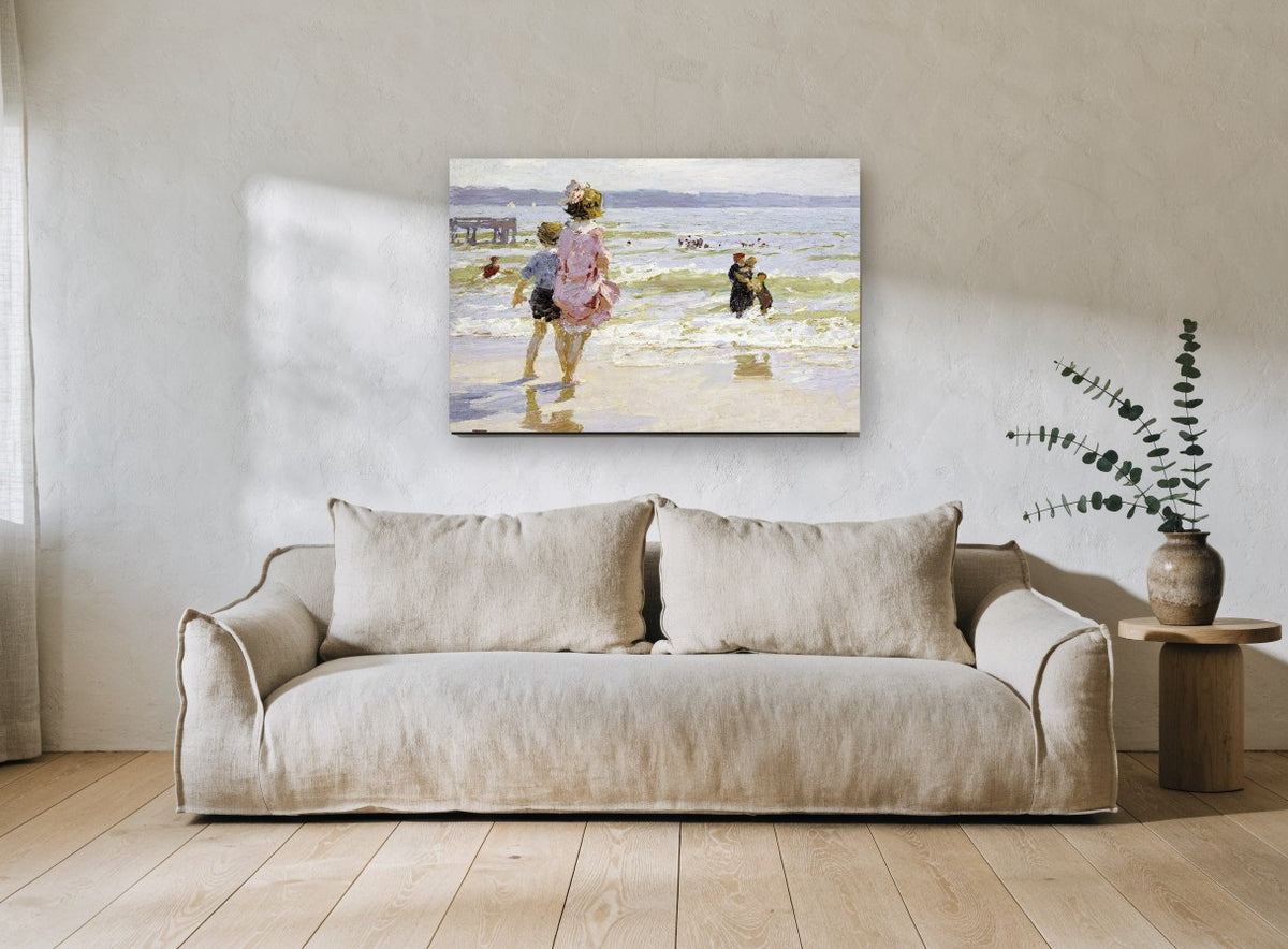 Children at the Shallows coastal canvas print on the wall of a living room