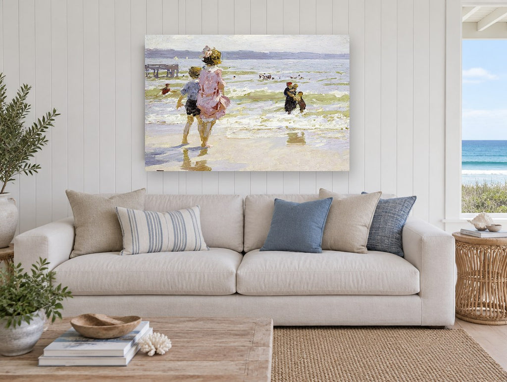 Children at the Shallows coastal canvas print on the wall of a beach house living room