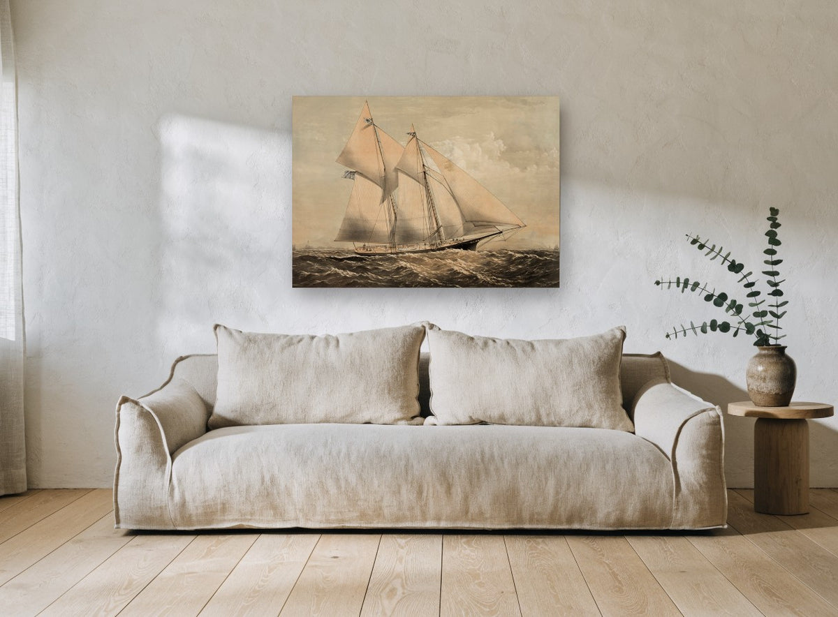 Sepia Schooner Voyager coastal canvas print on the wall of a living room