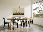 Meteor Under Full Sail coastal canvas print on the wall of a dining room