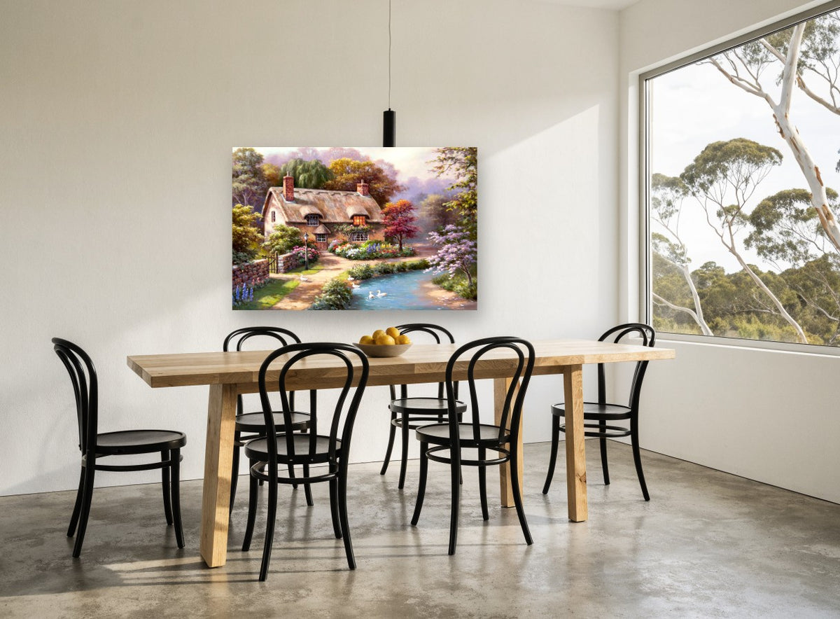 Thatched Cottage Duck Pond floral canvas print on the wall of a dining room