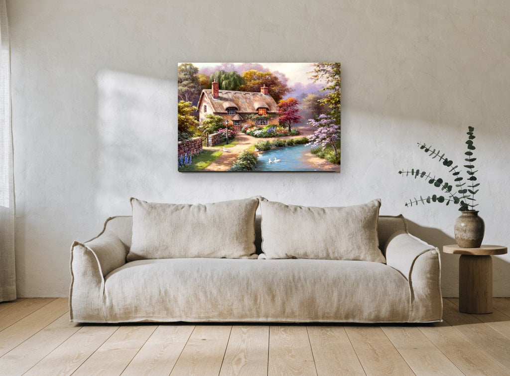 Thatched Cottage Duck Pond floral canvas print on the wall of a living room