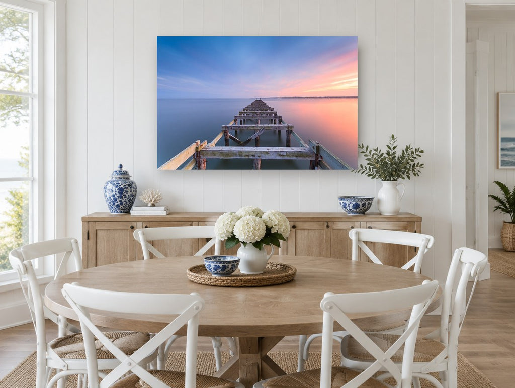 Dusk Along the Old Pier coastal canvas print on the wall of a Hamptons dining room