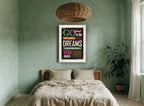 Go Confidently Dreams vintage canvas print on the wall of a bedroom