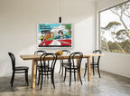 Our Love Is Our Journey vintage canvas print on the wall of a dining room