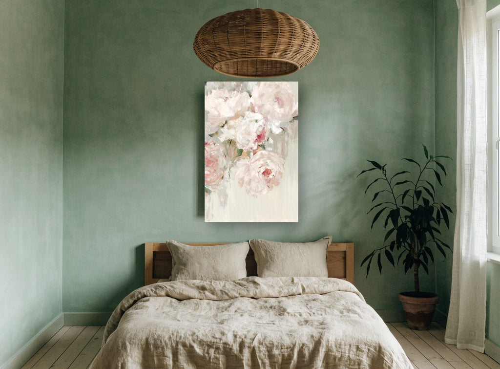 Blush Peony Drift floral canvas print on the wall of a bedroom