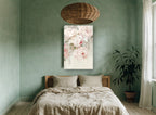 Blush Peony Drift floral canvas print on the wall of a bedroom