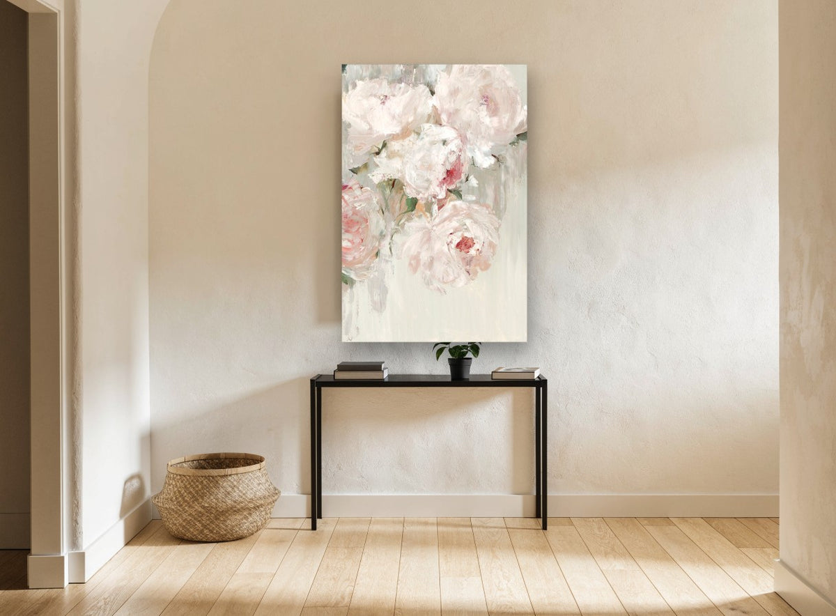 Blush Peony Drift floral canvas print on the wall of a hallway