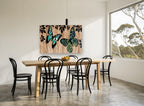 Butterflies on Woodgrain animal canvas print on the wall of a dining room