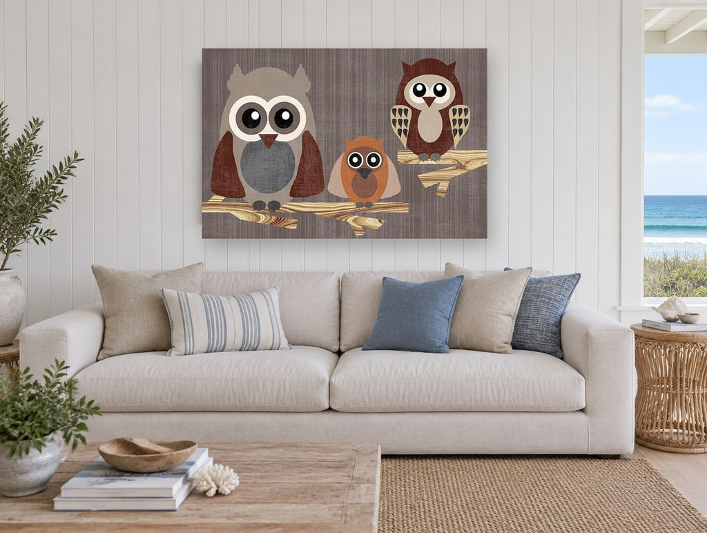 Owl Family on Branches animal canvas print on the wall of a beach house living room