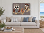 Owl Family on Branches animal canvas print on the wall of a beach house living room