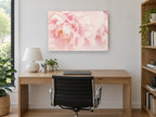 Blush Peony Bloom floral canvas print on the wall of a study