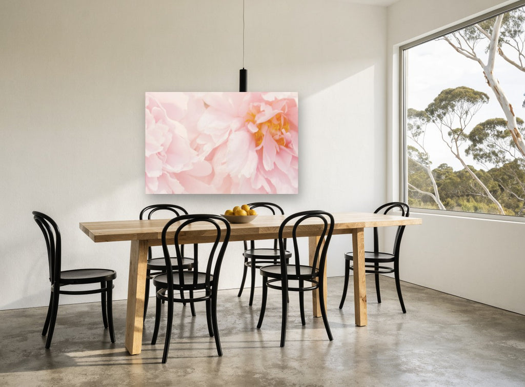 Soft Blush Peonies floral canvas print on the wall of a dining room