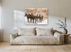 Six Horses in Snow vintage canvas print on the wall of a living room