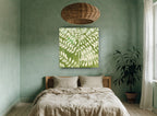 Cream Leaves on Green floral canvas print on the wall of a bedroom