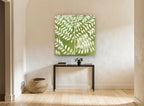 Cream Leaves on Green floral canvas print on the wall of a hallway