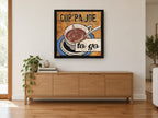 Cup'pa Joe To Go vintage canvas print on the wall of a living room above a sideboard