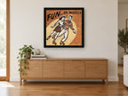 Fun On Wheels vintage canvas print on the wall of a living room above a sideboard