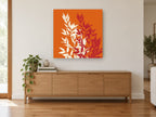 Cream and Crimson Sprigs floral canvas print on the wall of a living room above a sideboard