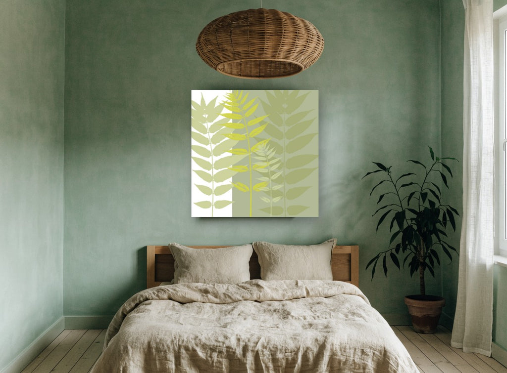 Layered Green Fronds floral canvas print on the wall of a bedroom