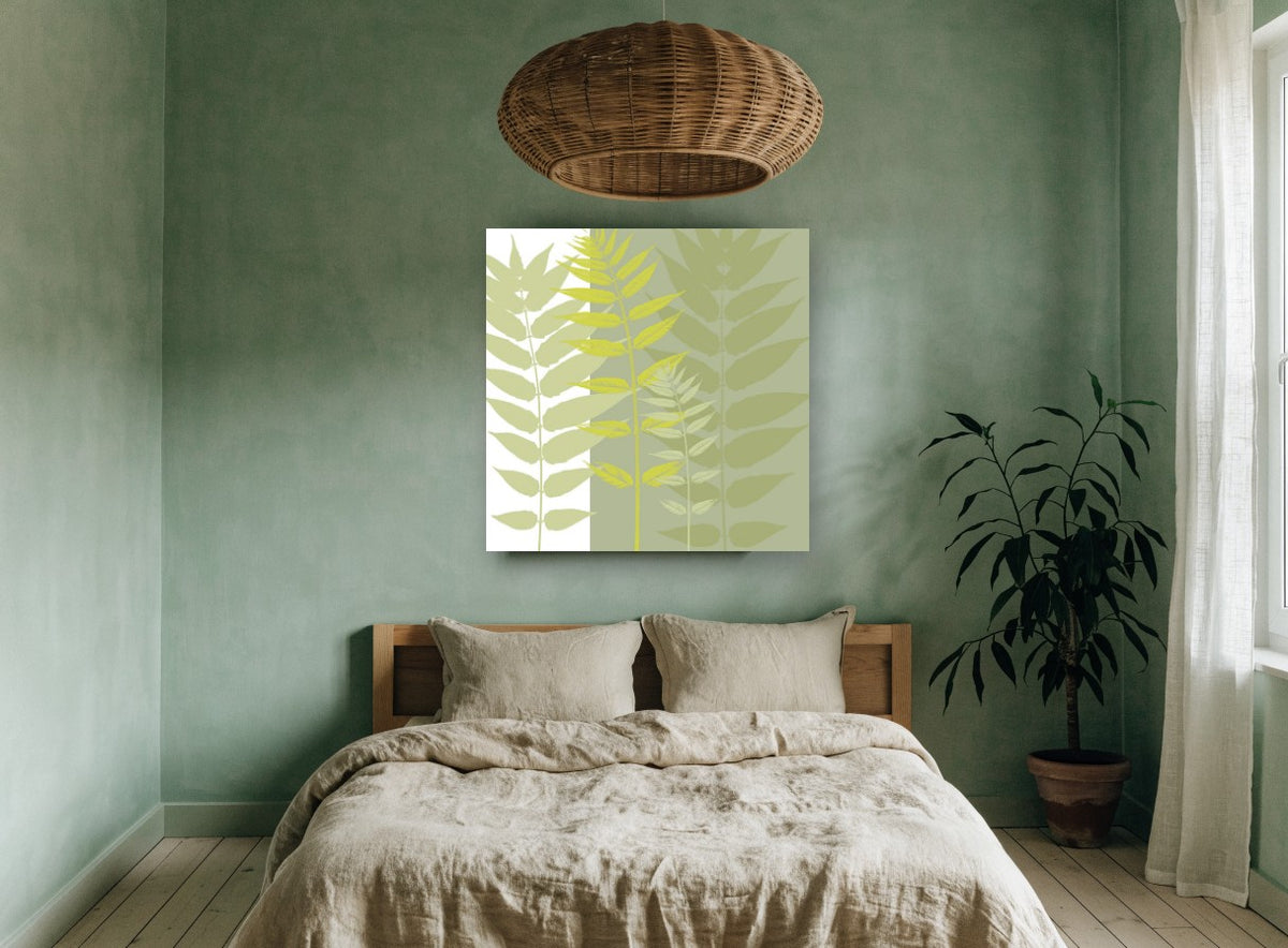 Layered Green Fronds floral canvas print on the wall of a bedroom