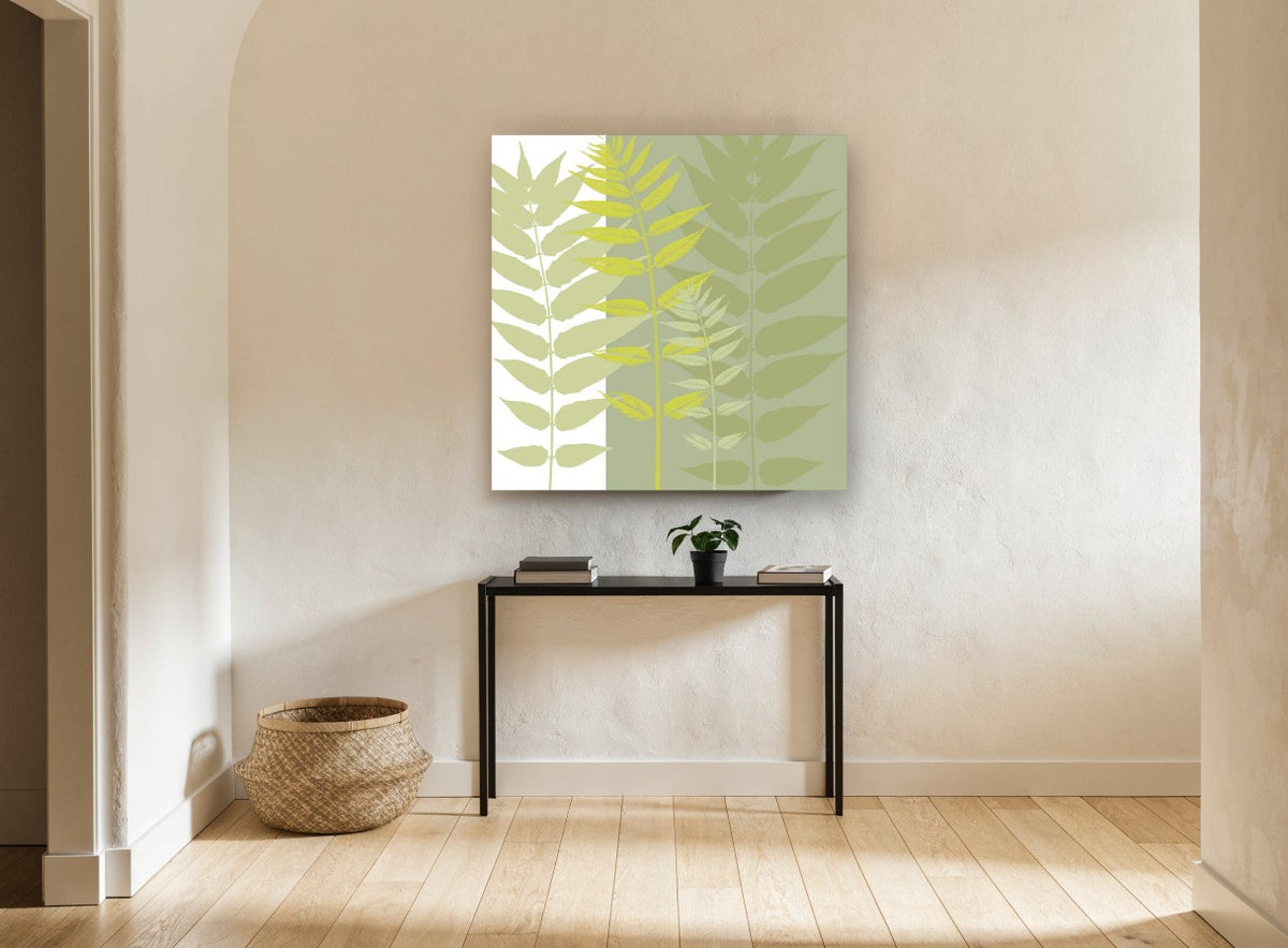 Layered Green Fronds floral canvas print on the wall of a hallway